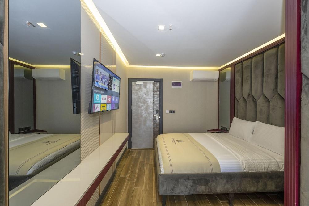 هيفين بريميوم أيربورت هوتل غرفة