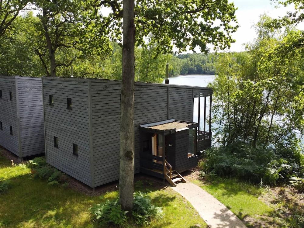 Grand Lakeside Retreat by Belvilla