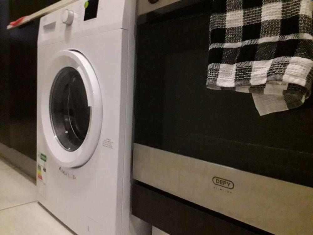 ساندتون إكزيكيوتيف  أبارتمنت غرفة غسيل