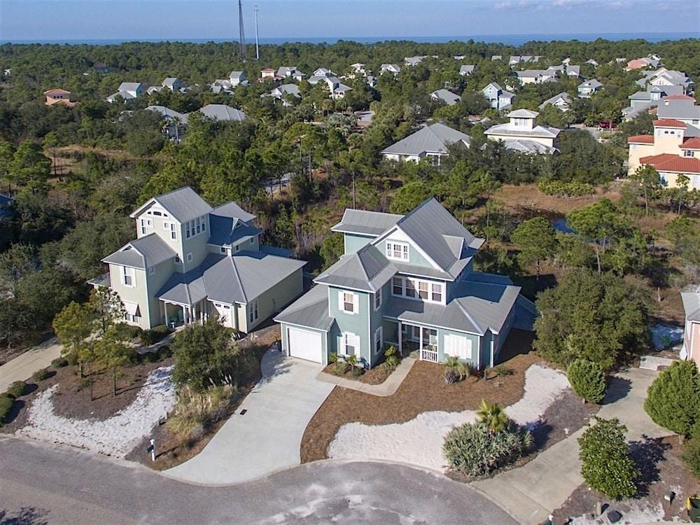 Coquille at Martinique Home features Golf Cart and Bikes to Use by RedAwning Aerial View