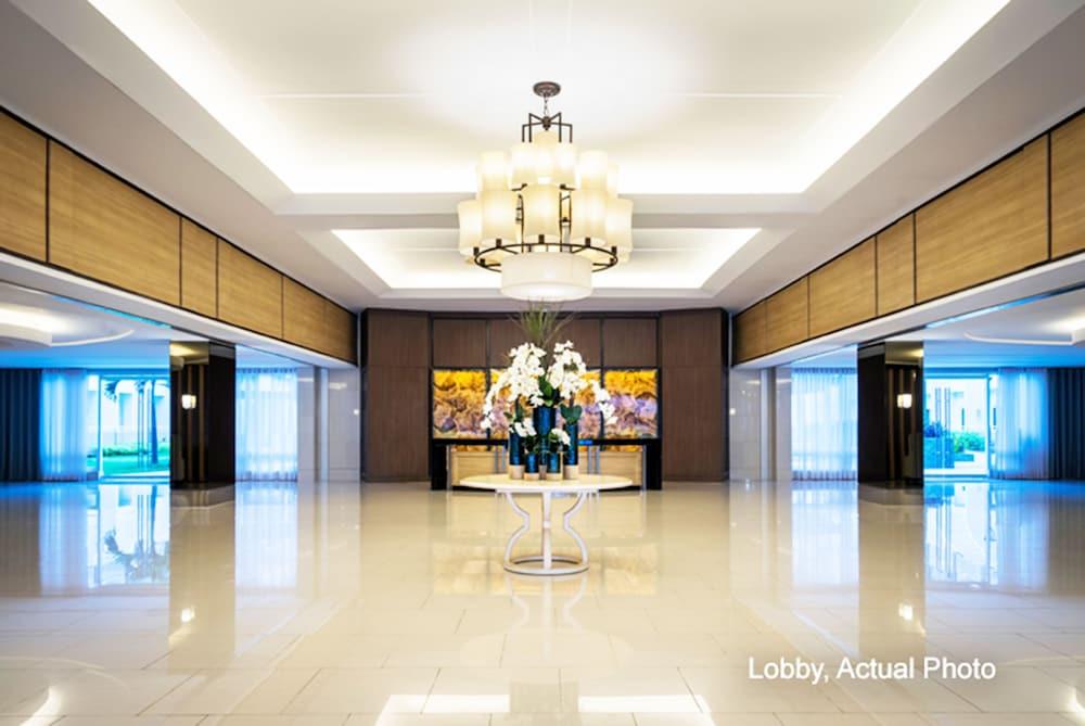 Shell Residences Apartment by Homebound Featured Image