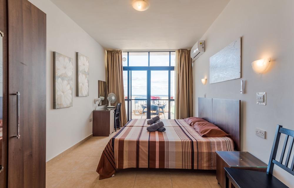 Seashells 2 bedroom Apartment with sunny terrace with stunning panoramic sea views by Getaways Malta