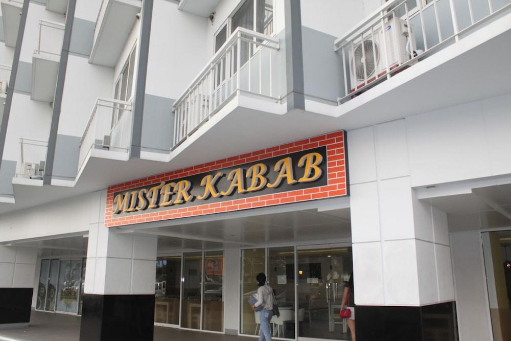 Shell Residences Apartment by Homebound Exterior detail