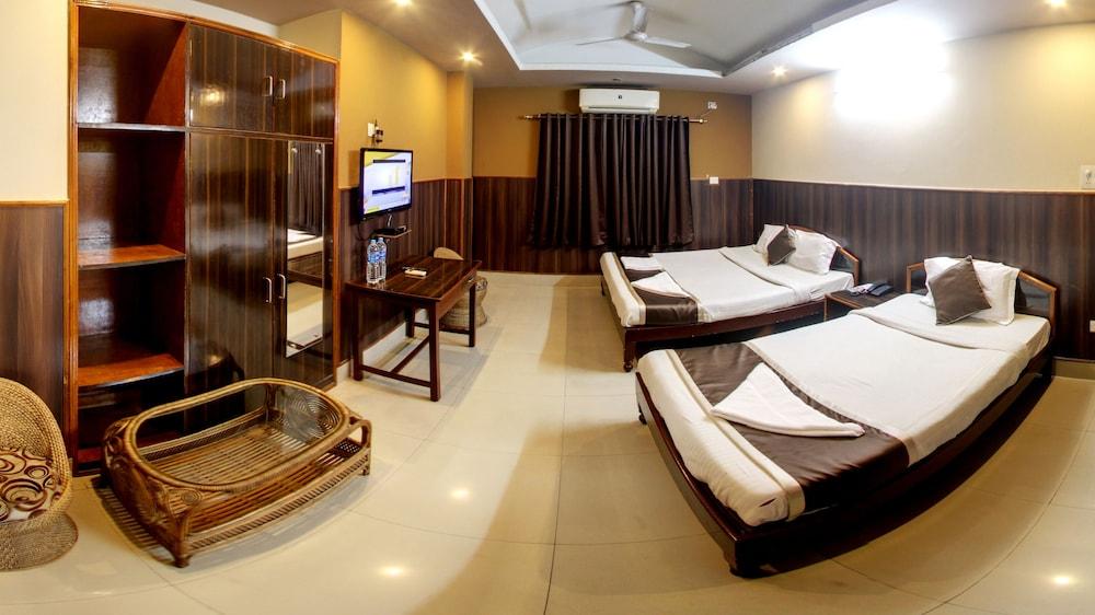 Om Shree Residency Room