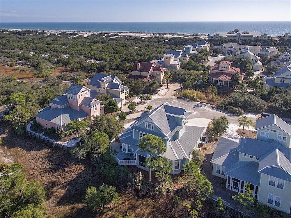Coquille at Martinique Home features Golf Cart and Bikes to Use by RedAwning Aerial View